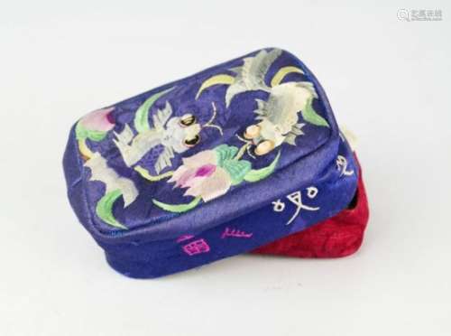 A Chinese embroidered silk work box circa 1920, depicting fish, calligraphy to the edges, 3 by 9
