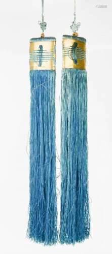 A pair of Chinese silk tassels, in blue and gold, 51cm long.