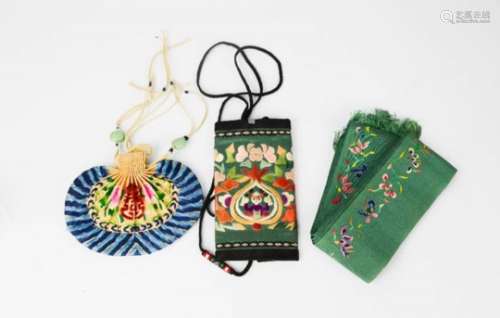An early 20th century embroiders, a silk purse, and an embroidered 1930s belt.