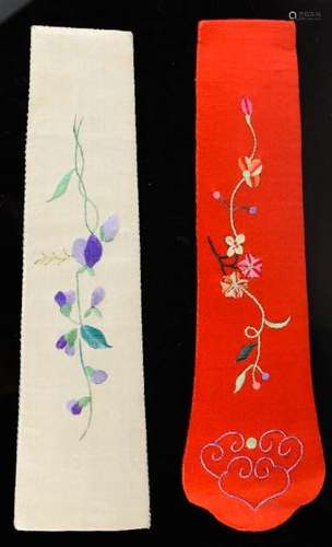 Two Chinese fan cases, both circa 1920, one in white silk, the other in red, and embroidered with