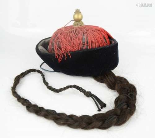 A Chinese Mandarin's miter hat with queue, 7th Rank, with lacquered wooden stand.