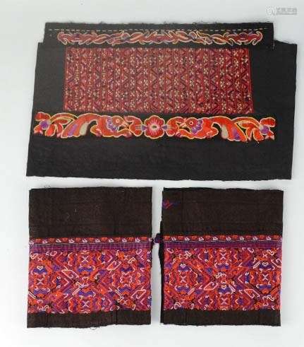 Three Miao Minority hand embroidered panels from Southern China, one having finely embroidered