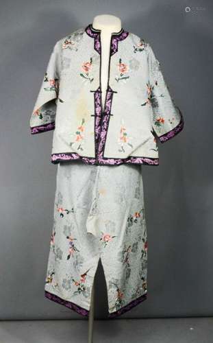 A Chinese silk hand embroidered jacket with matching trousers, circa 1930, in grey embroidered