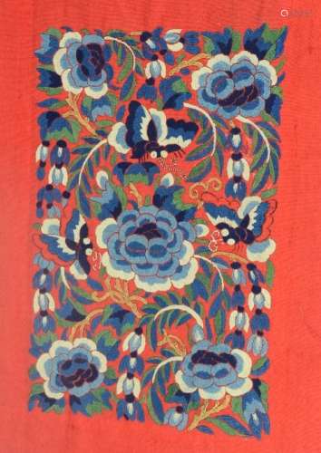 A Chinese embroidered skirt panel circa 1910, 'San Lan' three blues on a red ground depicting