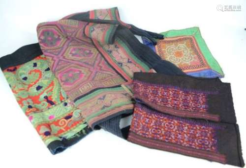 A group of Chinese Miao minority textiles from Southern China, including a baby carrier.