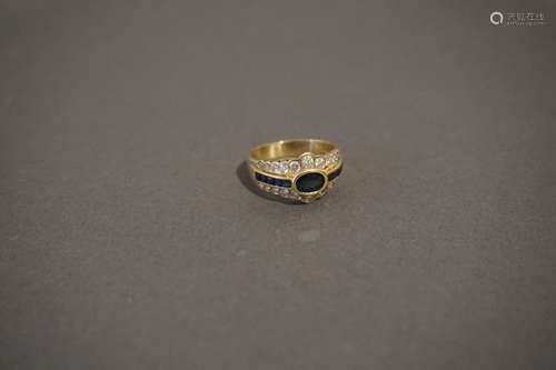 Bague en or 18 ct sertie de brillants et saphirs