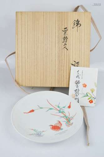 A Japanese porcelain plate by the 14th Sakaida Kakiemon, depicting quail, 21cm diameter, and