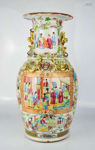 A Chinese canton famille rose vase with raised salamanders and enamelled with figural vistas.