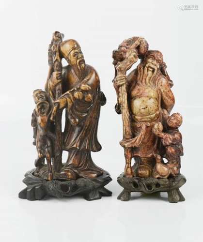 A pair of Chinese soapstone figures.