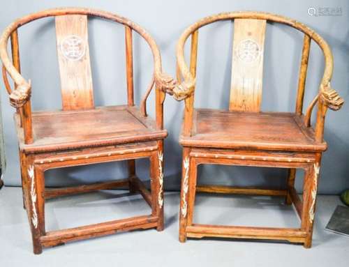 A pair of Chinese throne chairs, with mother of pearl inlaid decoration, and dragon head carved