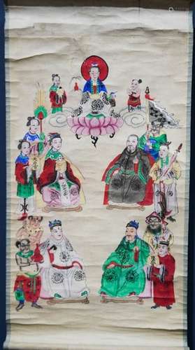 A Japanese hand painted scroll depicting court figures.