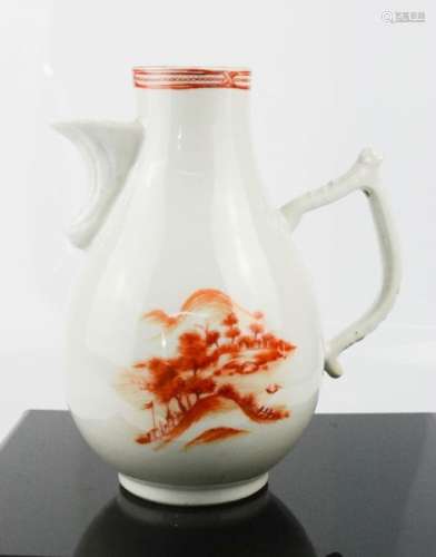 A Chinese jug, in red and white, depicting a landscape, early 19th century, 20cm high.
