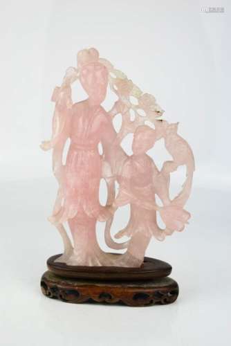 A Chinese rose quartz carved figure group, two geisha girls, raised on a stand, 21cm high.