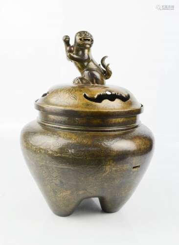 An early bronze censor, modelled with a dog of fo finial and engraved with dragon, sun and temple,