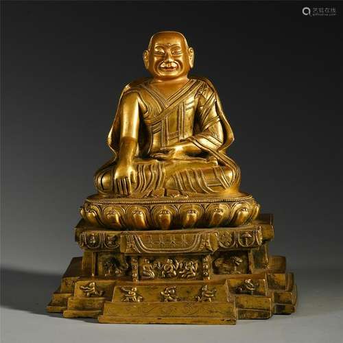 TIBETAN GILT BRONZE SEATED GURU