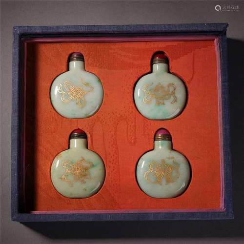 FOUR CHINESE GOLD PAINTED JADEITE SNUFF BOTTLES