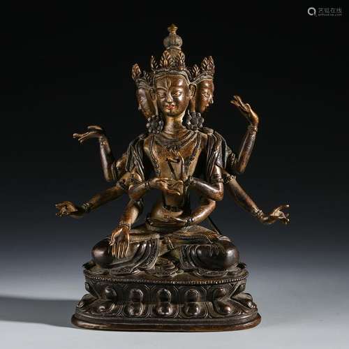 TIBETAN GILT BRONZE SEATED SIX ARM BUDDHA