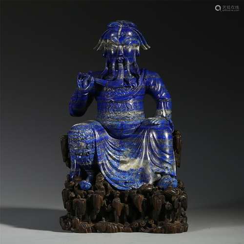 CHINESE LAPIS SEATED WARRIOR ON ROSEWOOD BASE