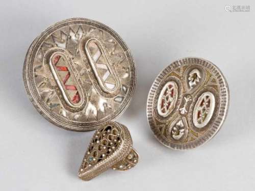 Three Kazakh silver rings of different size and shape. Richly decorated with open work, ornaments