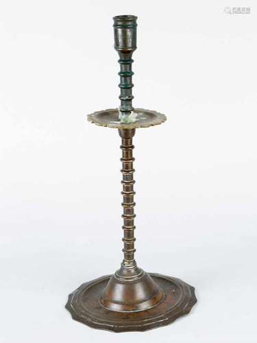 Nuremberg candlestick. Bronze cast with original patina with one spout turned decoration. 17/18th