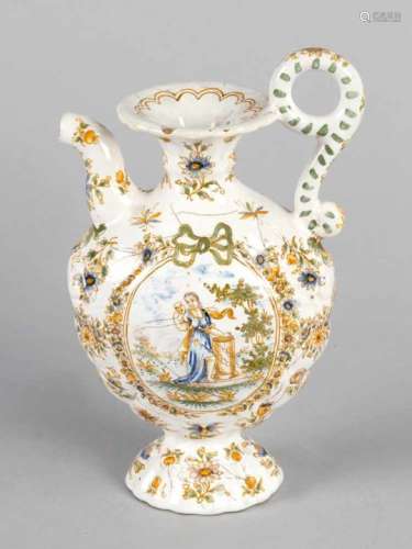 Italian majolica can with one spout and handgrip on oval base,painted with two shepherds in oval