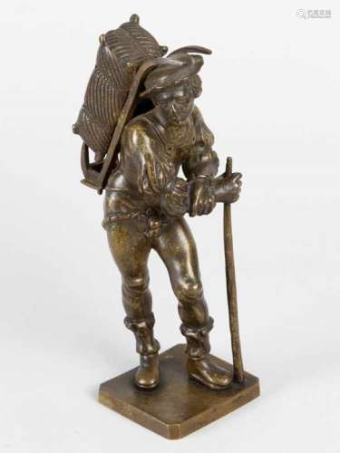 North Italian or French 16/17th Century, two bronze statues of travellers or hikers with load on