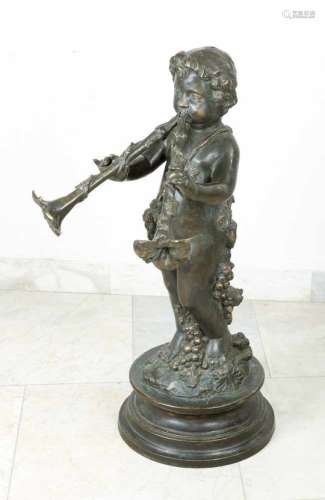 Bronze sculpture, standing boy blowing double pipe in shape of flowers surrounded by wine leafs
