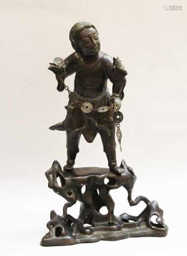 Asian Bronze Sculpture, Man with frog and luck coins on naturalistic base, bronze cast, hand