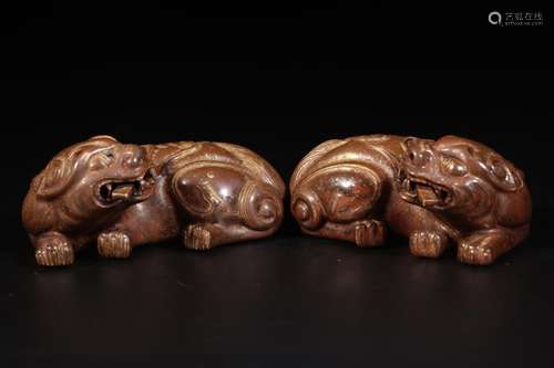 QIANLONG MARK SAUCE-GLAZE LION ORNAMENT IN PAIR