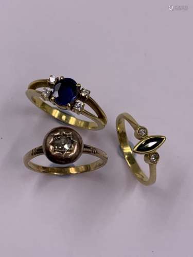 AN 18ct OVAL CUT SAPPHIRE AND DIAMOND RING (FINGER SIZE L 1/2), A MARQUIS CUT SAPPHIRE AND DIAMOND
