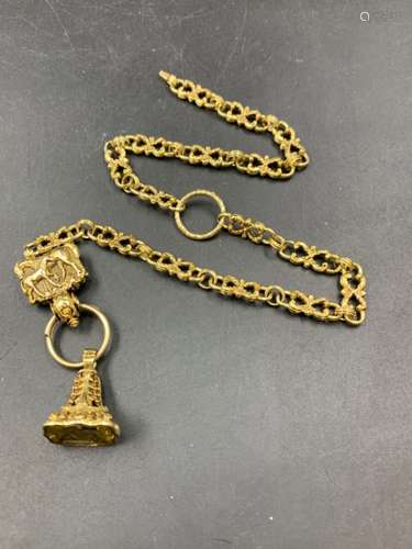 A YELLOW METAL FANCY LINK DOUBLE WATCH ALBERT WITH SEALING FOB AND HORSE MOTIF HOLDER. TOTAL