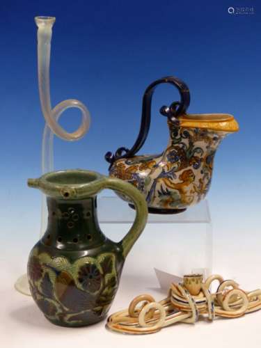 A PRATT PIPE WITH COILED STEM. W 21cms. A GLASS HORN WITH VASELINE MOUTHPIECE. W 35.5cms. A