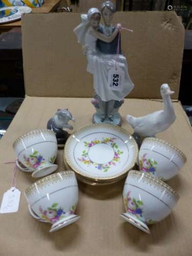 A LLADRO BRIDE AND GROOM GROUP. H 27cms. A LLADRO CAT AND MOUSE, A NAO GOOSE AND FOUR BERESFORD CUPS