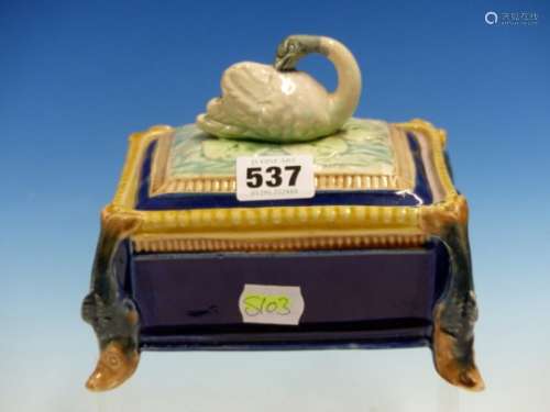 A 19th C. MAJOLICA SARDINE BOX, THE RECTANGULAR COVER WITH SWAN FINIAL, THE CORNERS OF THE BLUE BODY