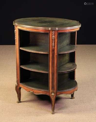 An Oval Free-Standing Bookcase in the Louis XVI Style.