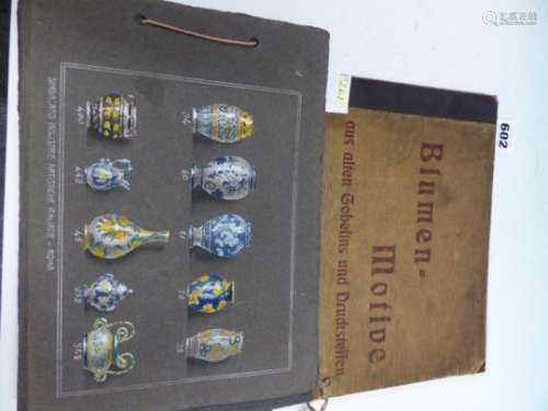 A ROMAN BOOK OF HAND PAINTED MAJOLICA DESIGNS, EACH GREY PAPER PAGE. 18.5 x 25cms. TOGETHER WITH A