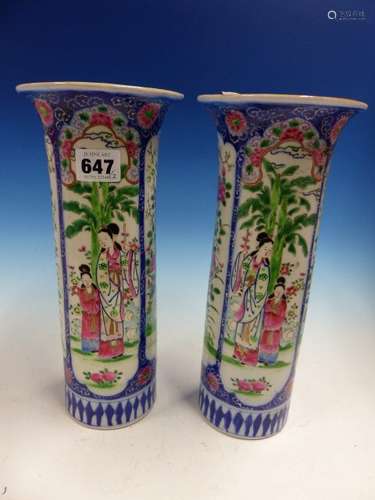 A PAIR OF JAPANESE FAMILLE ROSE SLEEVE VASES PAINTED WITH BLUE FRAMED PANELS OF LADIES AND