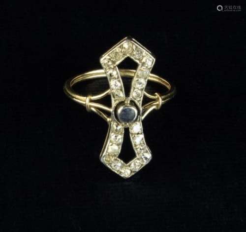 A Vintage Diamond Ring with blue cabochon stone to the centre.