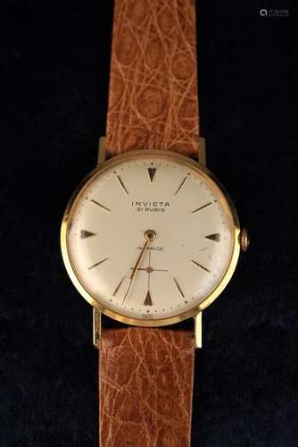 An Invicta 18 Carat Gold Wrist Watch 21 Rubis Incabloc numbered 24487.