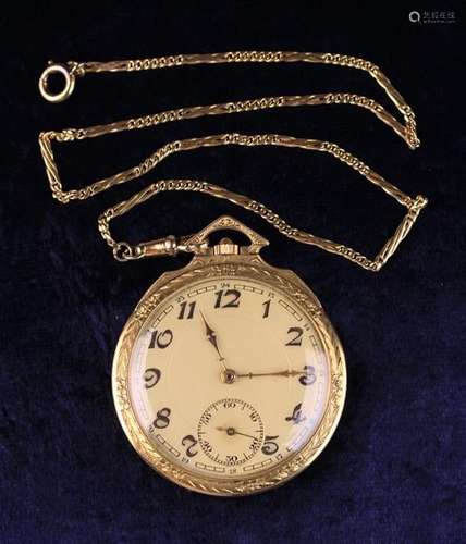 A Decorative 18 Carat Gold Pocket Watch on gold figaro chain, the last link being base metal.