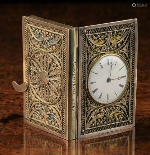 A Rare 19th Century Silver & Gilt Pocket Watch modelled as a Book.