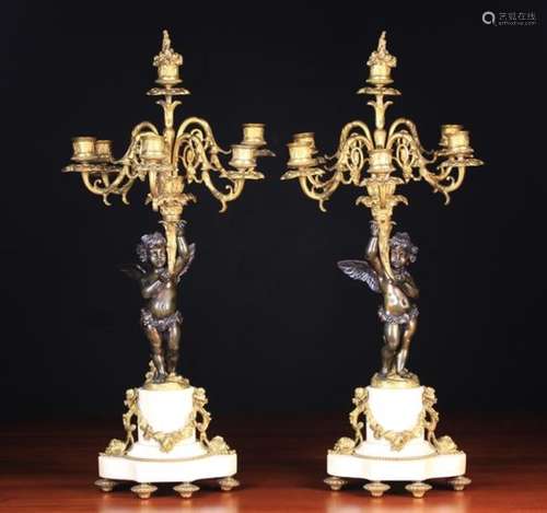 A Pair of 19th Century Louis XVI Style Figural Bronze Candelabra.