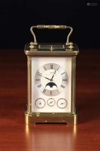 A Matthew Norman Gilt Brass Carriage Clock.