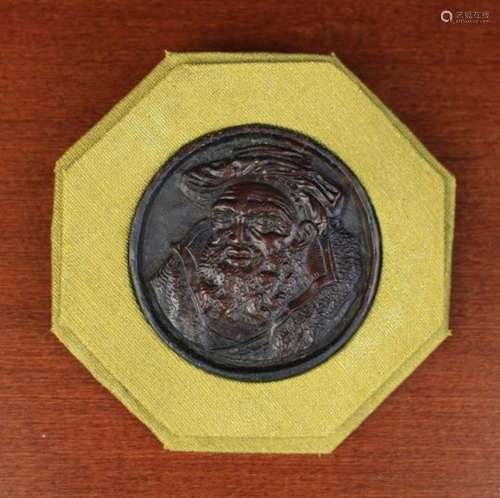 A Renaissance Carved Boxwood Roundel Plaque depicting a bearded nobleman,