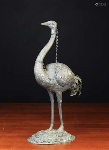 A Fabulous Late 19th Century Ostrich Egg Holder composed of embossed & chased sheet metal with