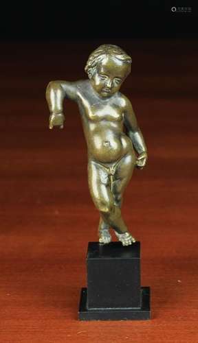 A Small 17th Century Bronze Figure of a Putto attributed to Francois Duquesnoy, 4½