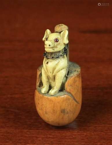 A 19th Century Carved Novelty Pig in a Poke;