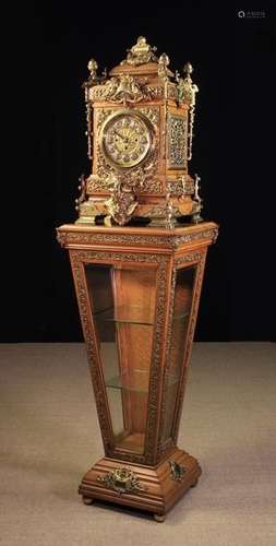 A Large & Highly Decorative Late 19th Century Gilt Mounted Oak Clock raised on a pedestal display