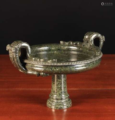 A Dark Green Serpentine Marble Tazza. The circular dish raised on a turned centre column.