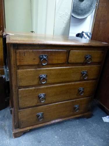 A PAIR OF BESPOKE OAK SMALL CHESTS OF TWO SHORT AND THREE LONG DRAWERS ON BRACKET FEET.